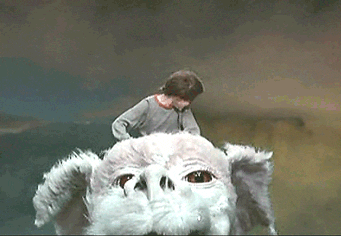 Falcor from Never ending Story flying